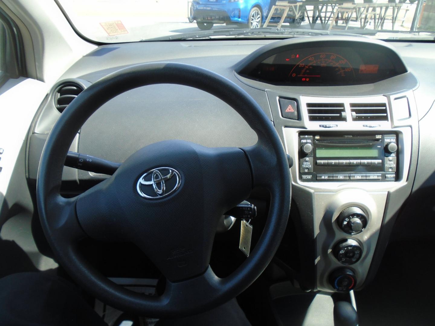 2010 BLUE /Grey Toyota Yaris Liftback 5-Door AT (JTDKT4K39A5) with an 1.5L L4 DOHC 16V engine, 4-Speed Automatic transmission, located at 6112 N Florida Avenue, Tampa, FL, 33604, (888) 521-5131, 27.954929, -82.459534 - Photo#9